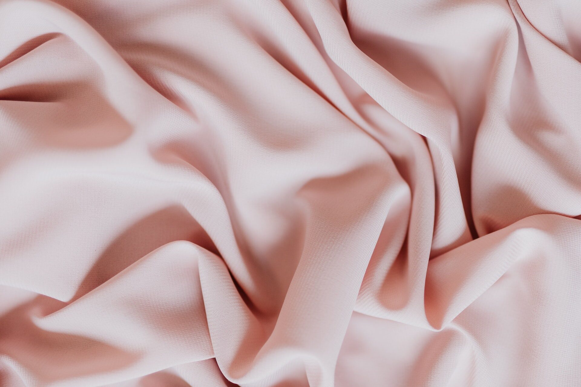 Fabric for bridal lehenga. Photo by Karolina Grabowska: https://www.pexels.com/photo/light-pink-textile-in-close-up-photography-4814055/