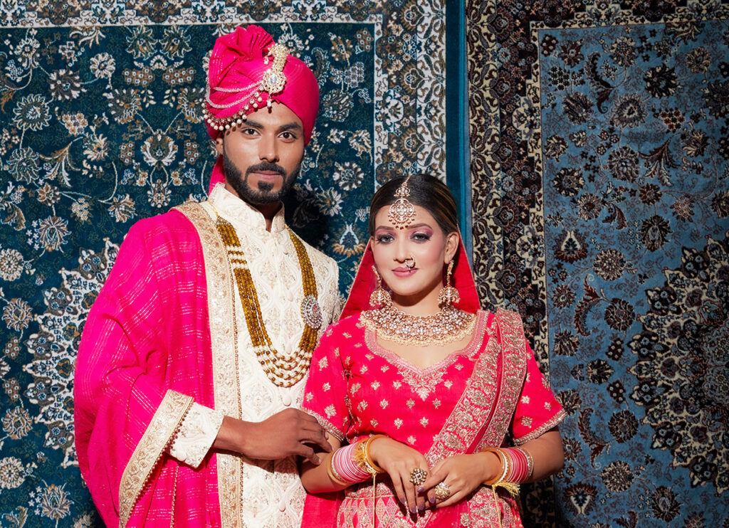 Groom in a sherwani and bride in a lehenga